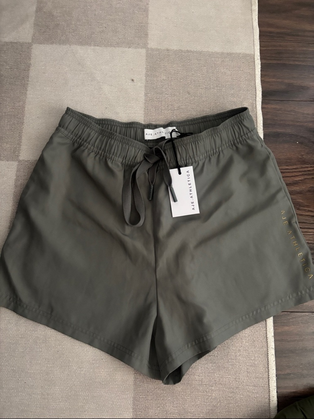 Aje Athletic Shorts in Olive Green